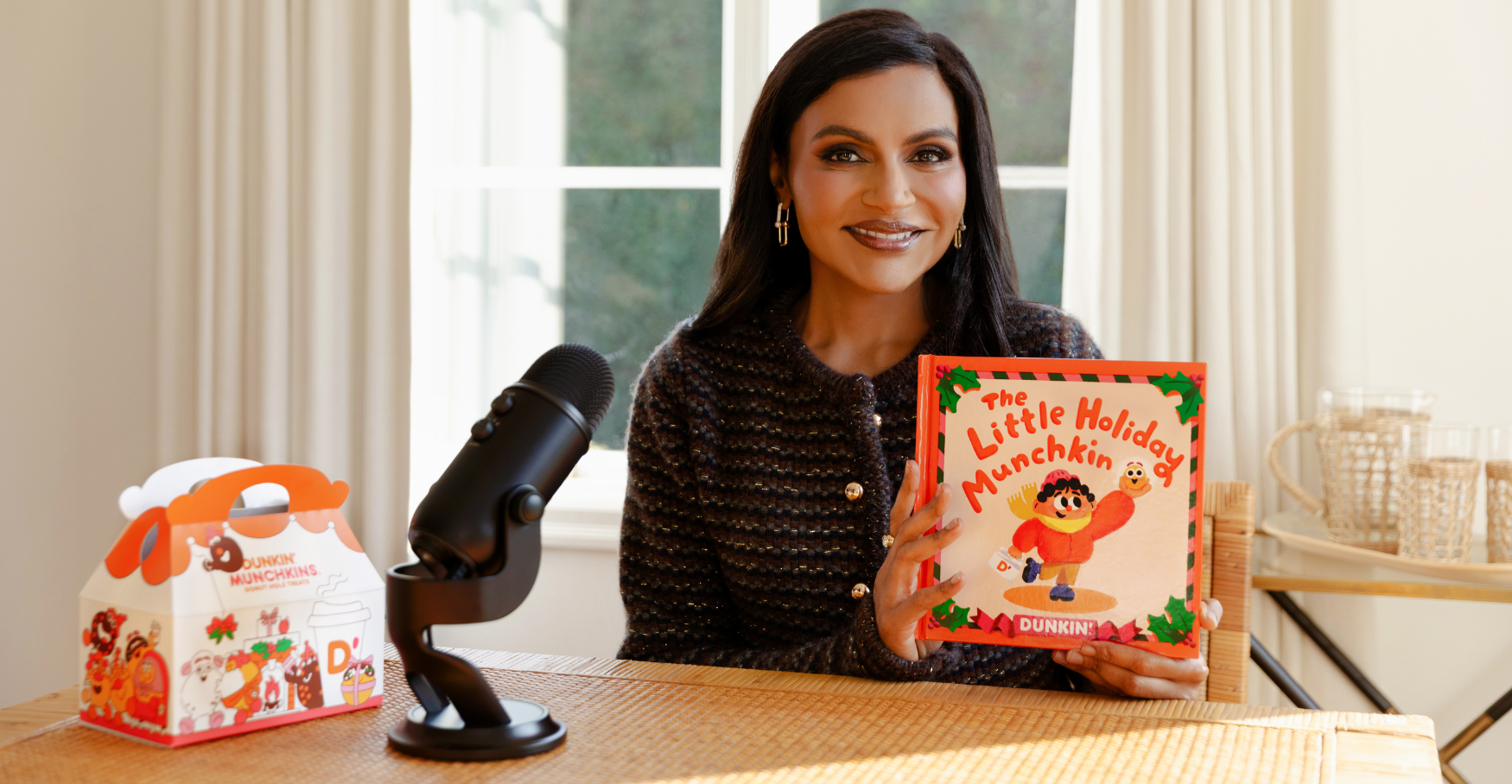 Photograph of Dunkin's The Little Holiday Munchkin book with Mindy Kaling 
