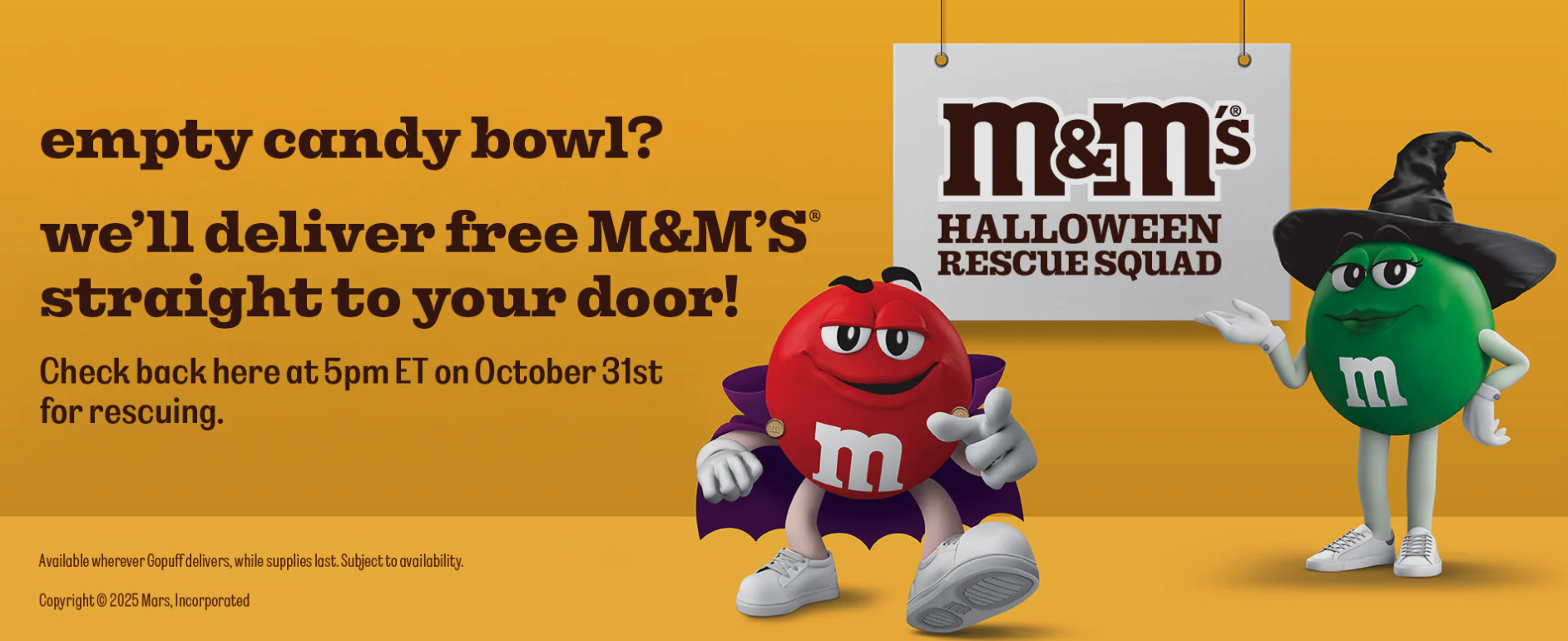 M&Ms 2025 Halloween rescue squad banner with a yellow background and red and green M&M on the front in costume