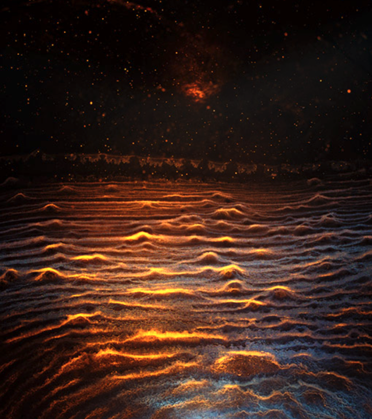 the remains of a malt scotch at the bottom of a glass appear celestial and otherworldly