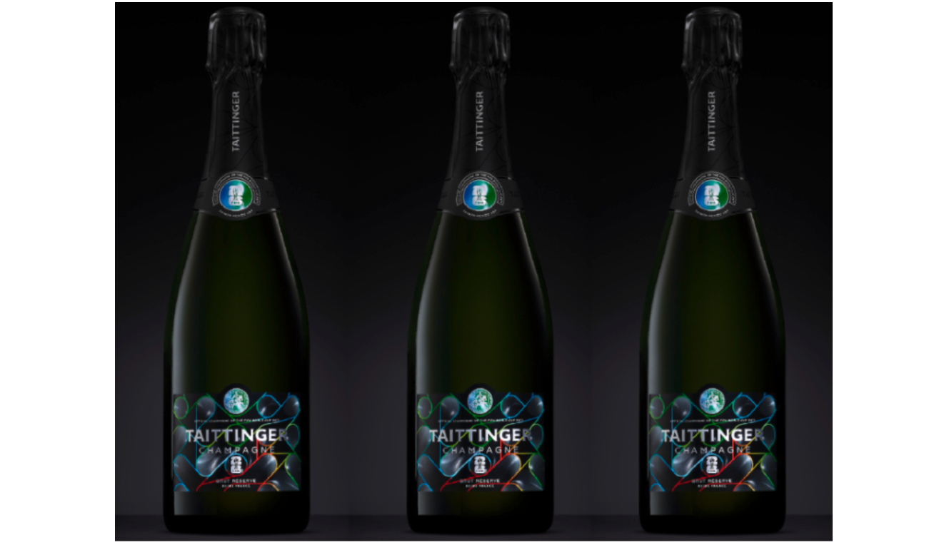 Three exclusive champagne bottles sit in a row. 