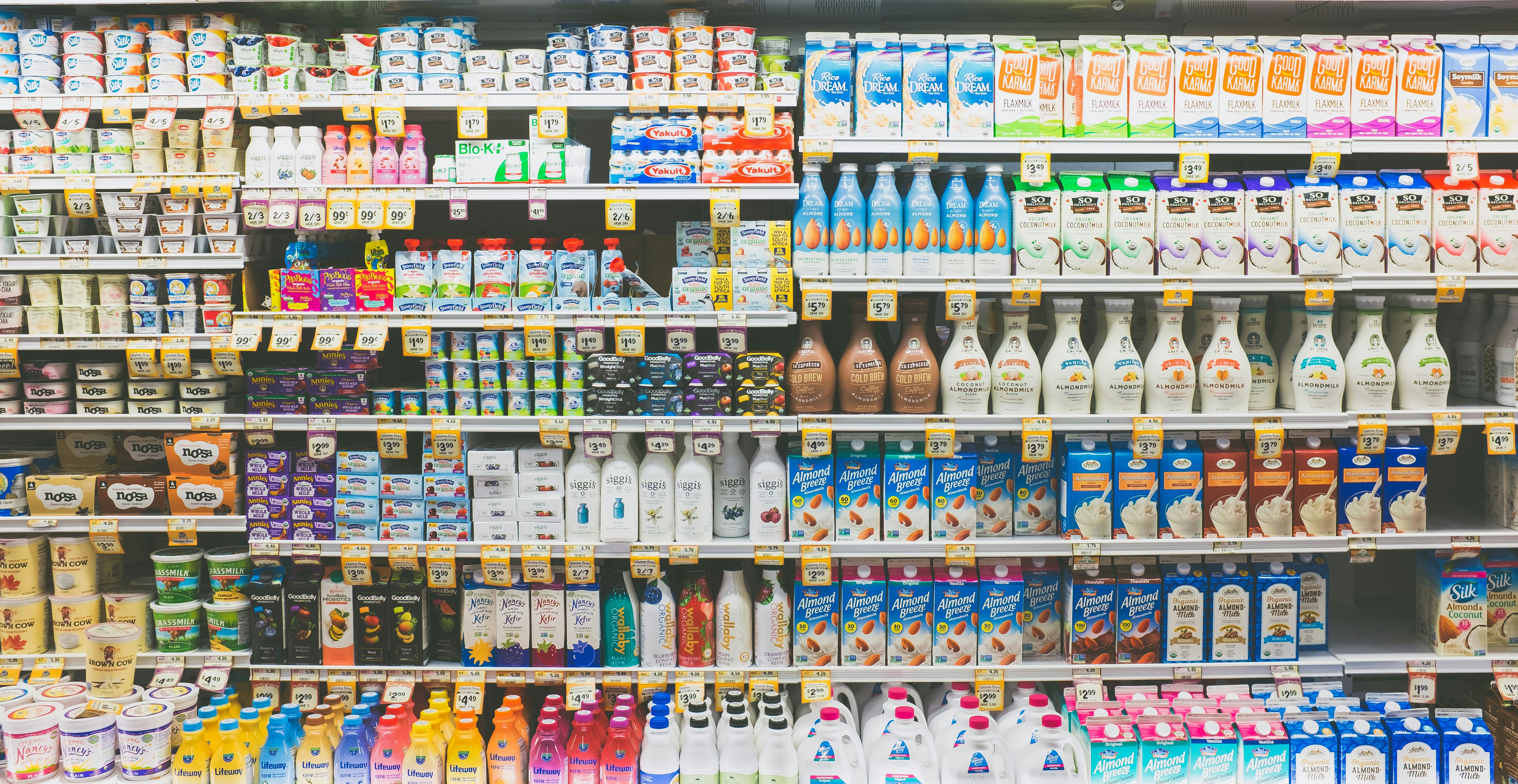 “retail store shelf featuring a variety of colorful products”